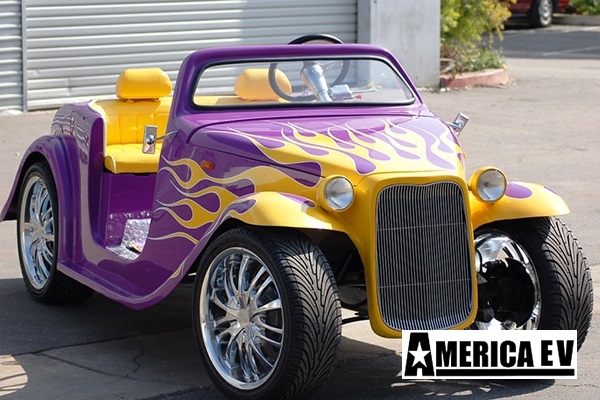 Purple California Roadster with Yellow Flames affordable golf cart rental, golf cart rent greensboro