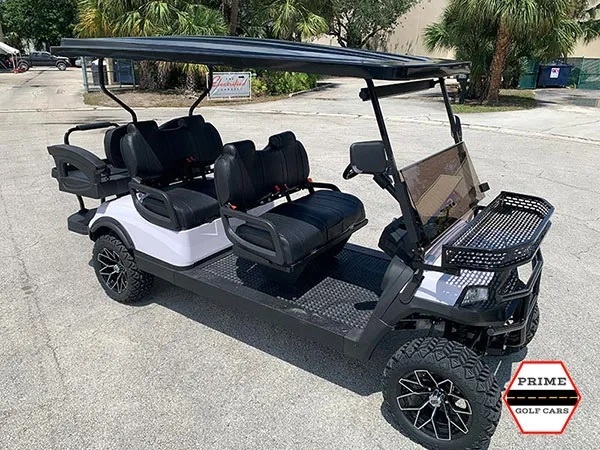 White Aluma 6 Passenger Lifted Golf Cart affordable golf cart rental, golf cart rent greensboro